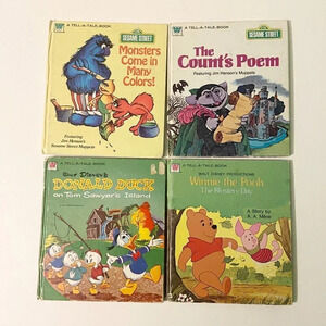 Vintage Lot of 4 Whitman Books  Tell a Tale Sesame Street Donald Duck Winnie